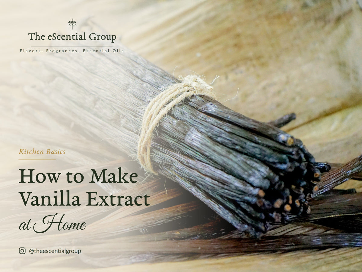Bundle of dried vanilla beans tied with twine on a wooden surface